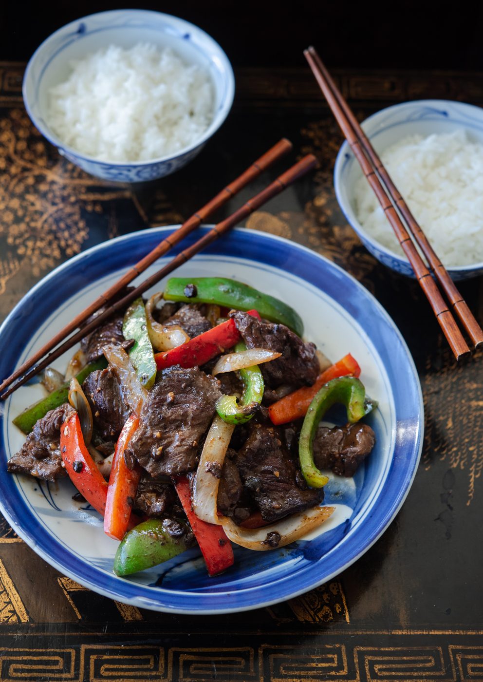 Chinese pepper steak stir fry is best to serve hot with rice