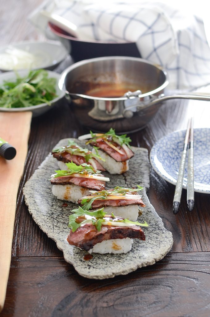 Beef Steak Sushi is adorned with kitchen-made teriyaki sauce.