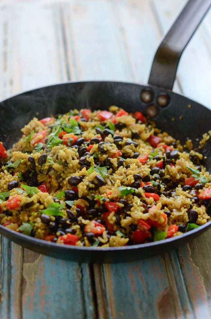 Black Bean Quinoa Curry Rice is cooked in a skillet