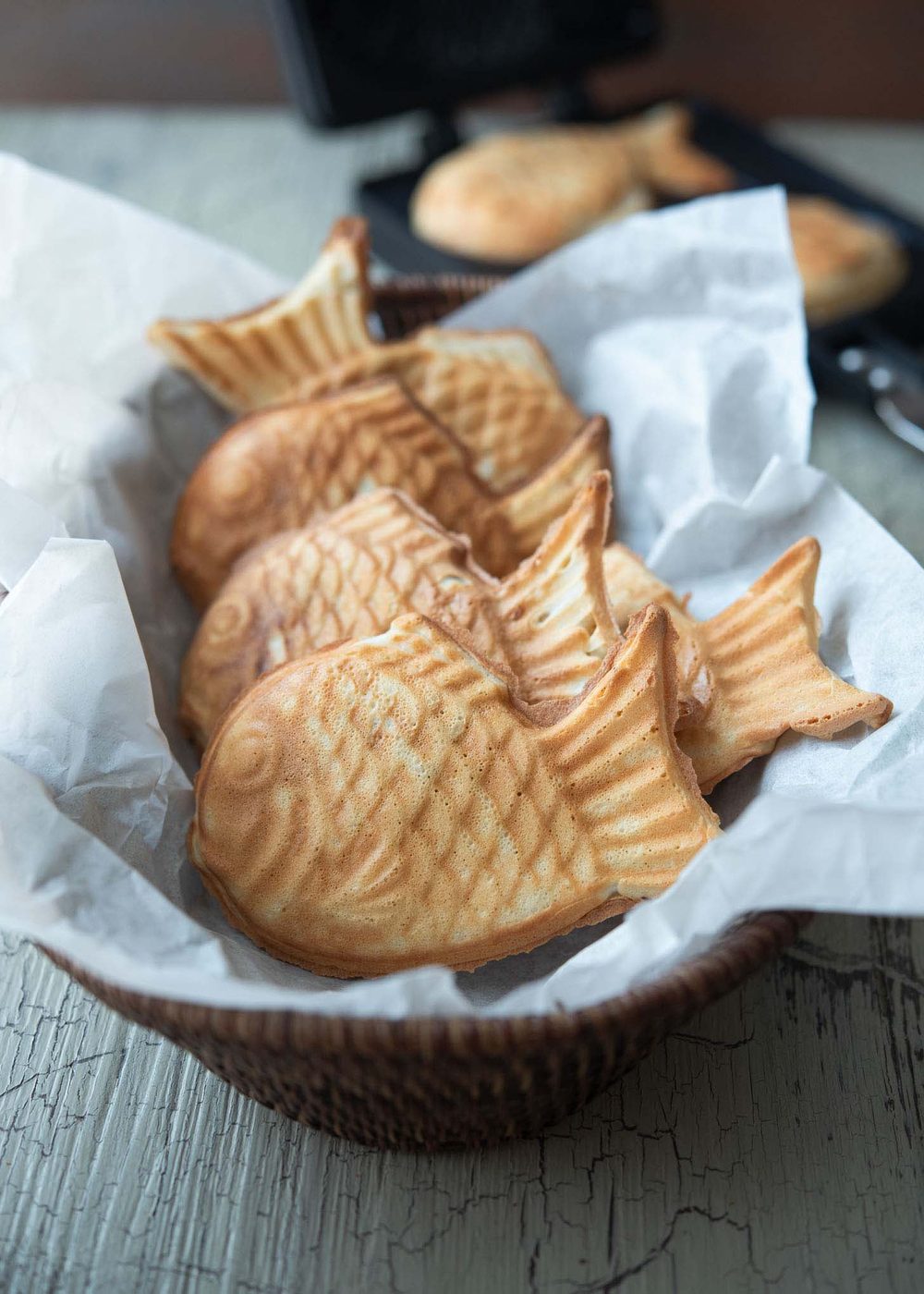 Bungeoppang, Korean fish shaped taiyaki bread, in a basket.
