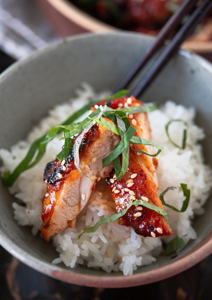Chicken bulgogi served over rice with a glossy gochujang glaze and lightly charred edges.