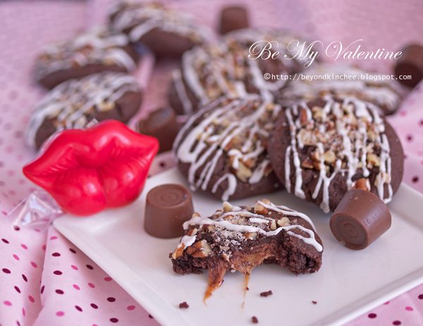 chocolate caramel cookies with red lip novelty on a plate.