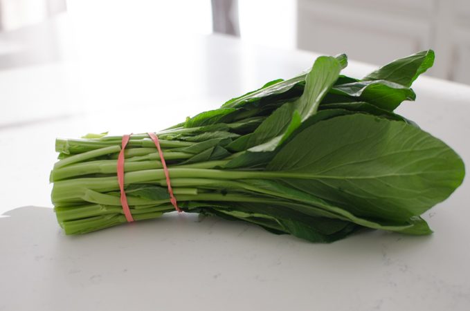 Raw choy sum with stems and leafy tops