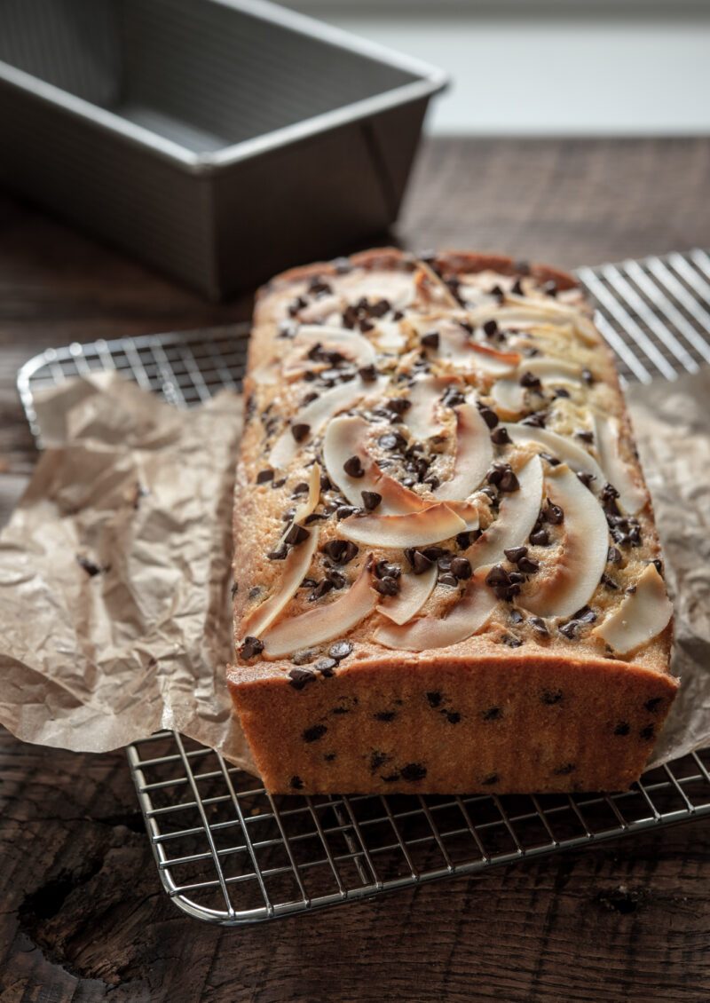 A loaf of coconut chocolate chip cake.
