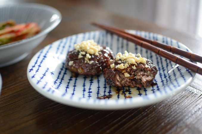 Korean short rib patties showing their chewy texture inside.