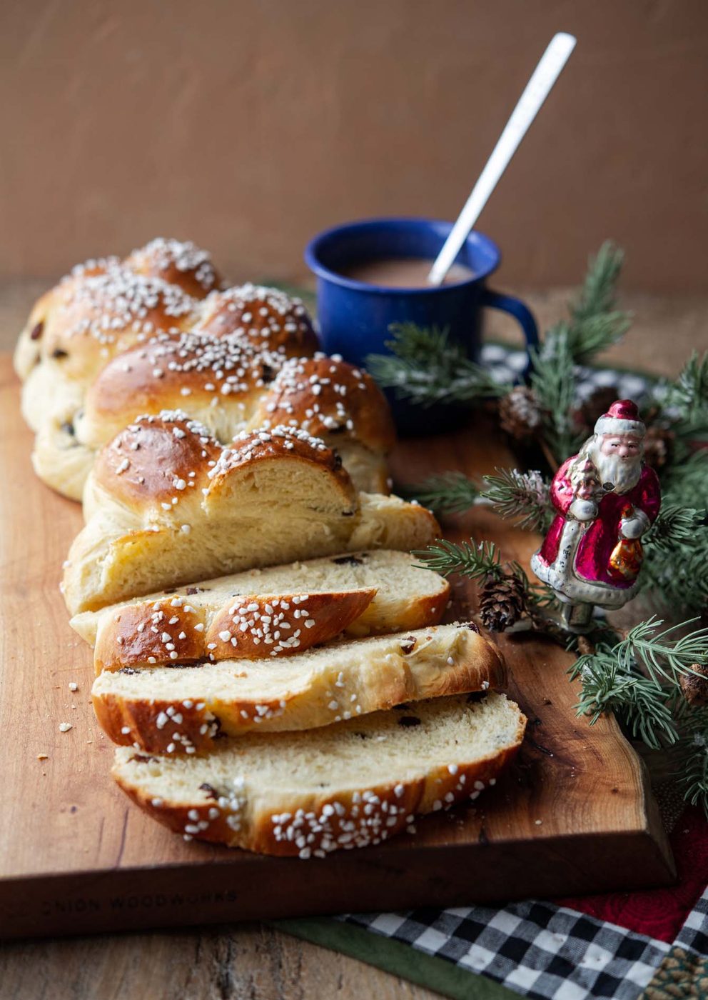 Braided Finnish pulla bread with a mug of hot chocolate.
