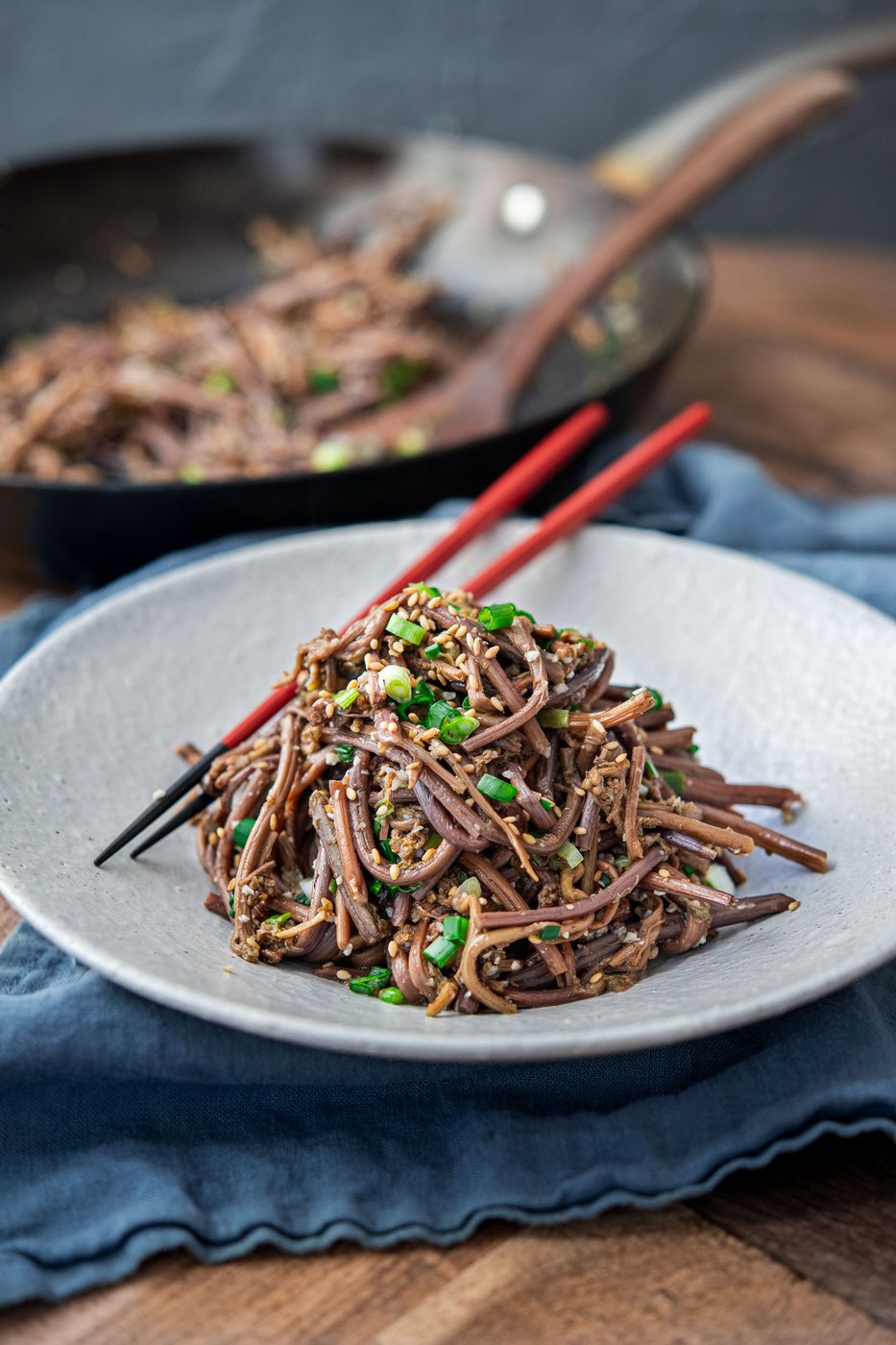 Korean gosari namul (bracken fern) served as a side dish with sesame oil, green onion, and sesame seeds