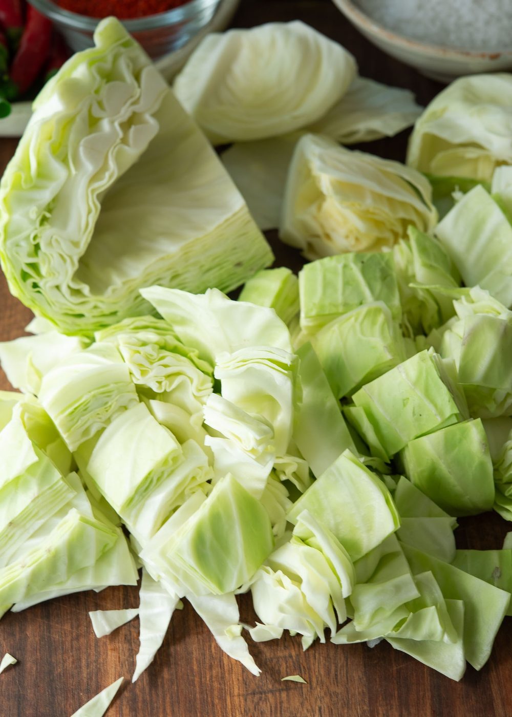 Green cabbage chopped into large pieces.