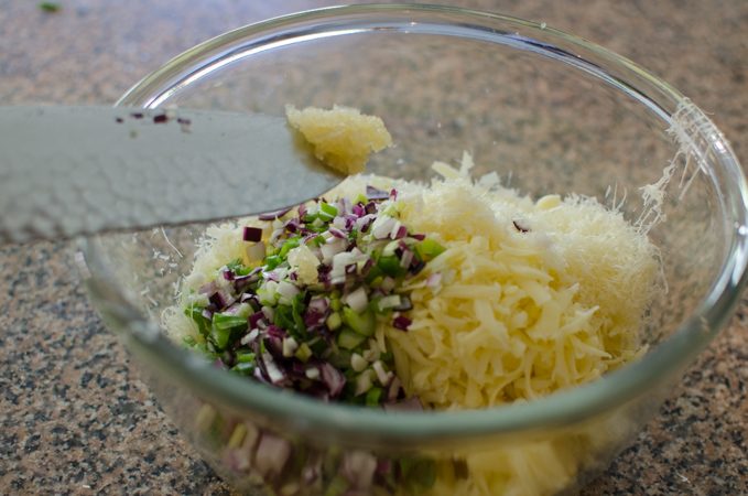 Mixture Parmesan and Mozzarella cheese with green onion and garlic makes a savory dip.