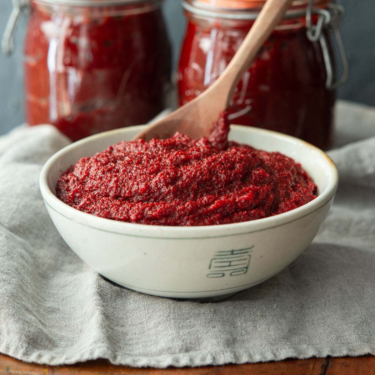 A bowl of kitchen-made gochujang (Korean chili paste).