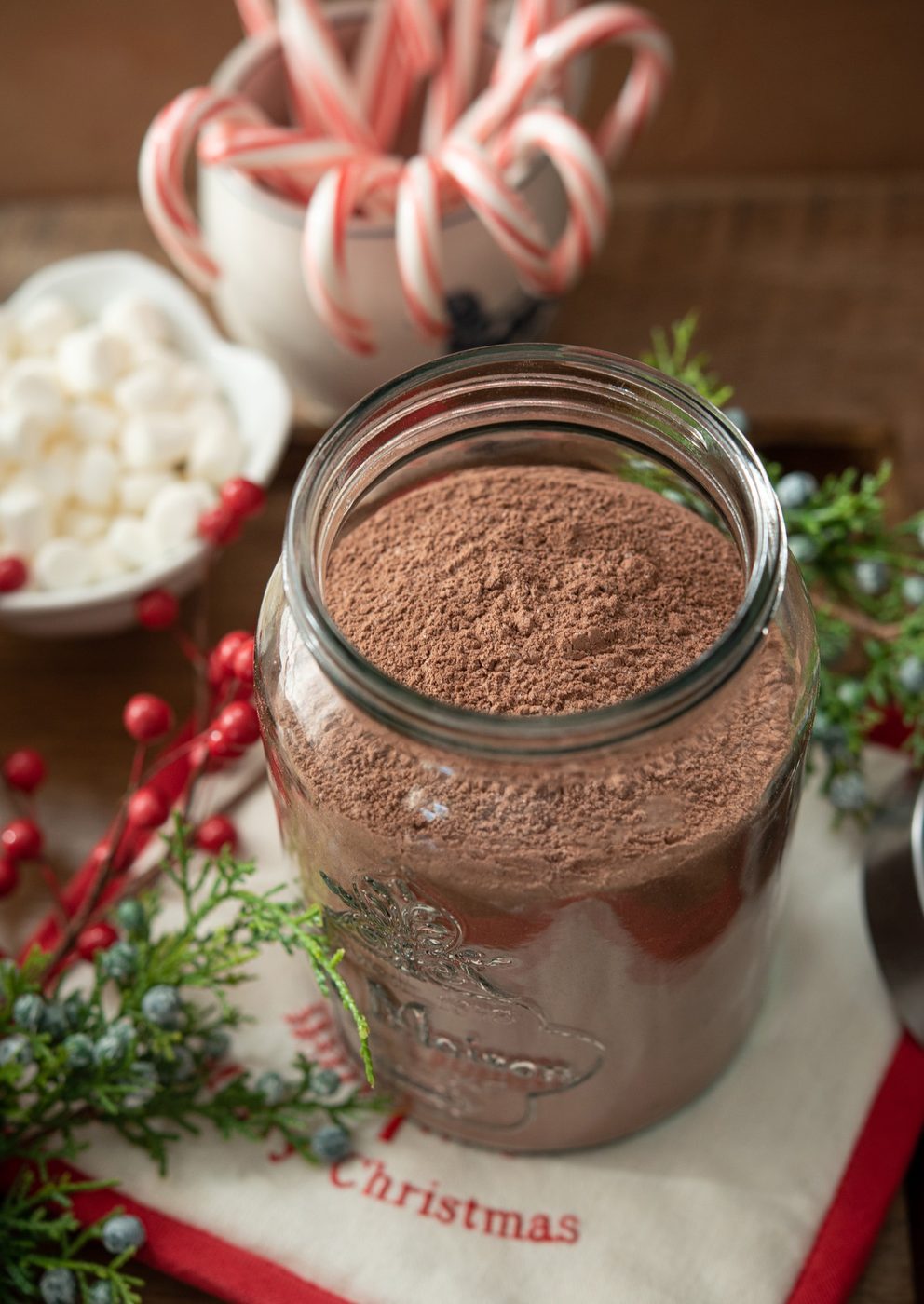 Kitchen-made hot cocoa mix in a glass jar.