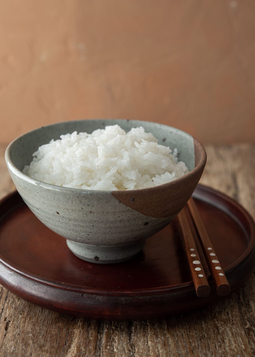 A bowl of evenly cooked Korean short grain white rice is presented.