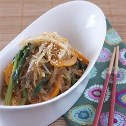 Japchae salad in a serving dish.