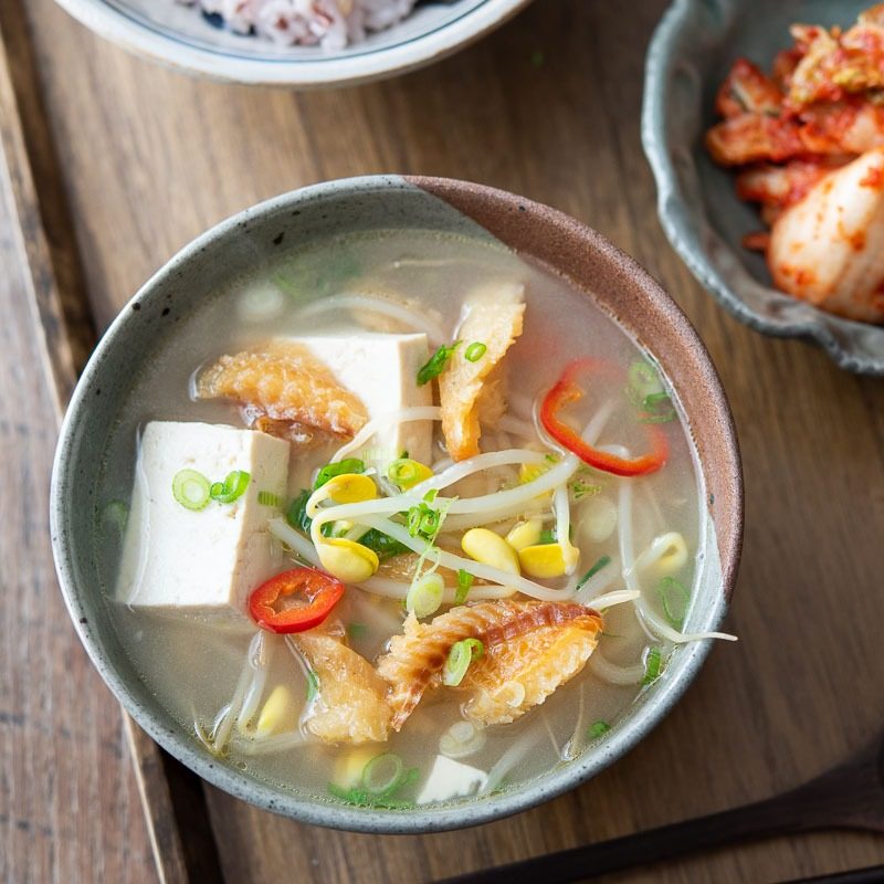 Dried pollock soup with soybean sprouts and tofu is a short Korean breakfast
