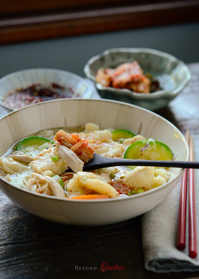 Hand torn noodle soup (sujebi) in a bowl.
