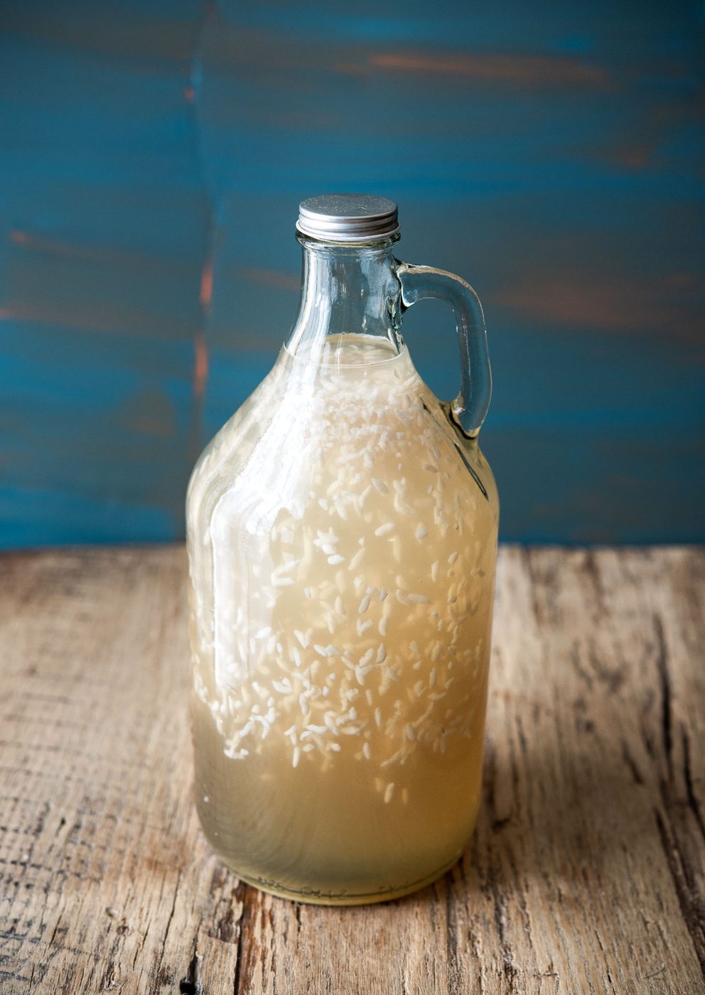 Kitchen-made Korean rice drink sikhye in a glass bottle