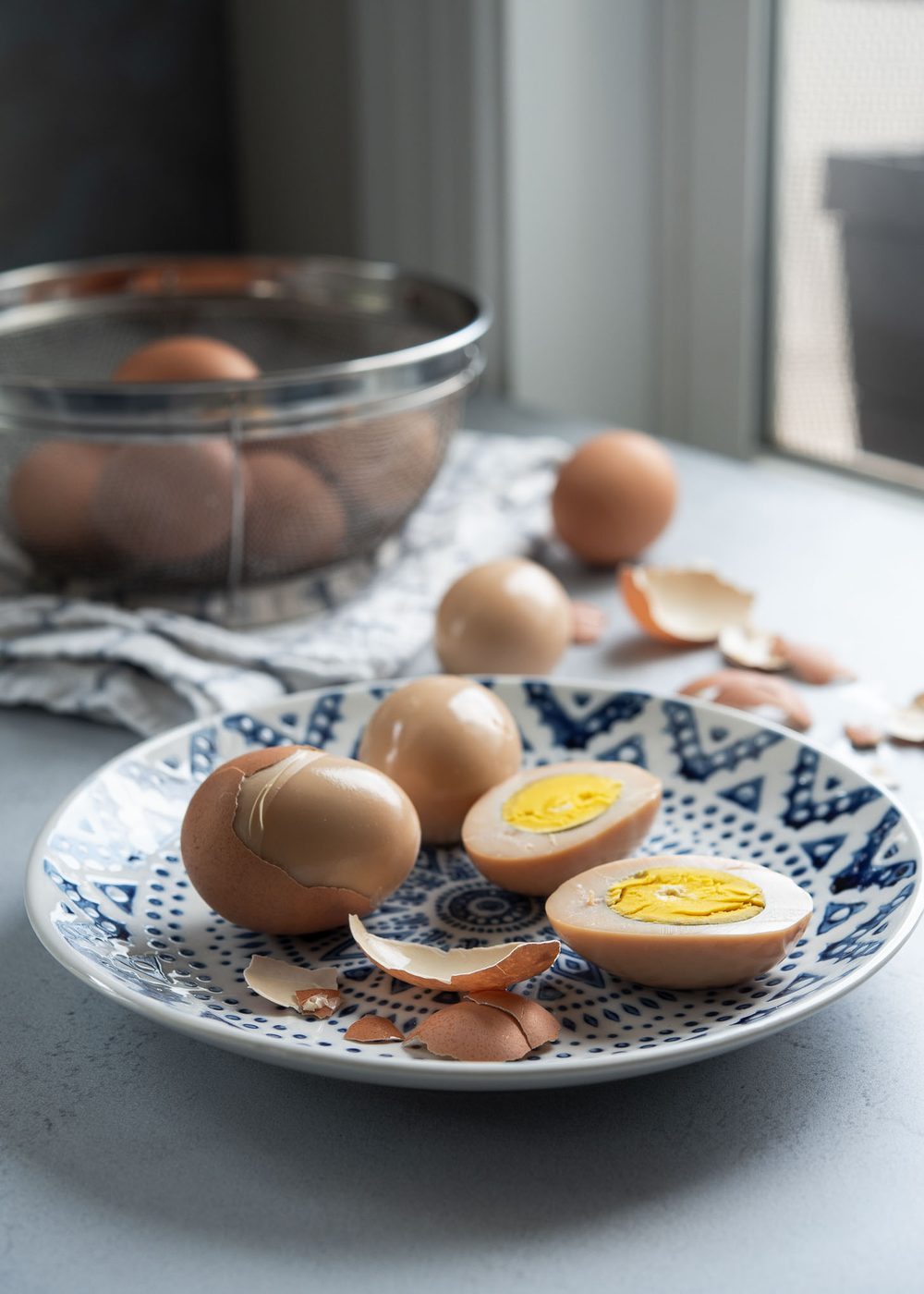 Korean sauna eggs are peeled and cut to show the yolks inside.