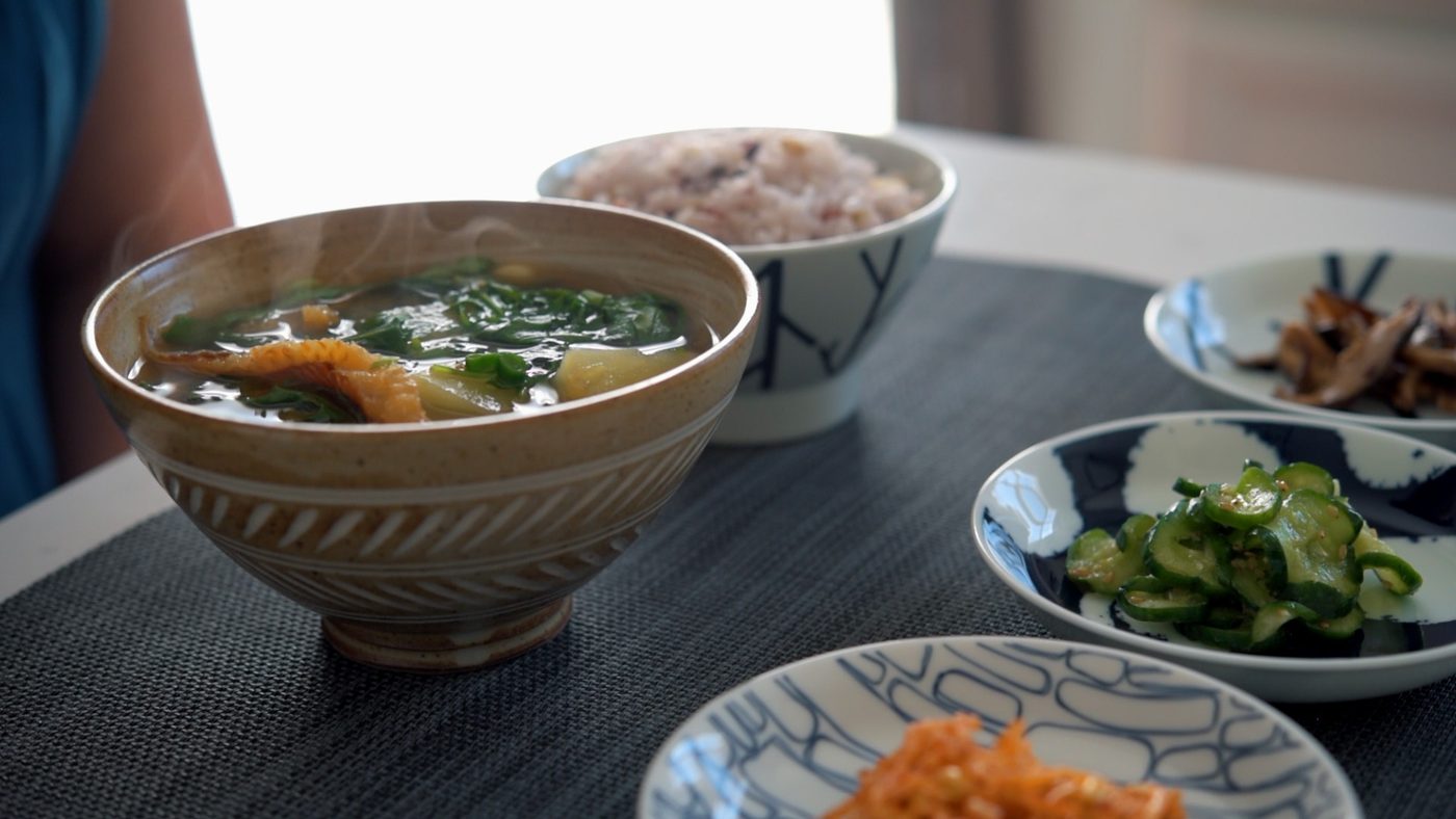 This short Korean soup with arugula and potato is flavored with dried pollock fish and Korean soybean paste.