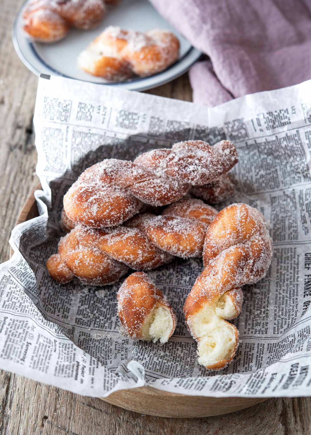 Inside view of a twisted donut showing its soft, fluffy texture