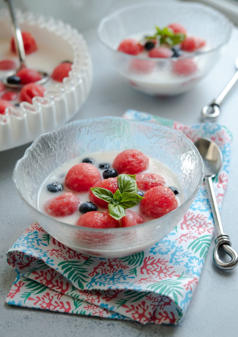 Refreshing watermelon punch served in a glass bowl with blueberries