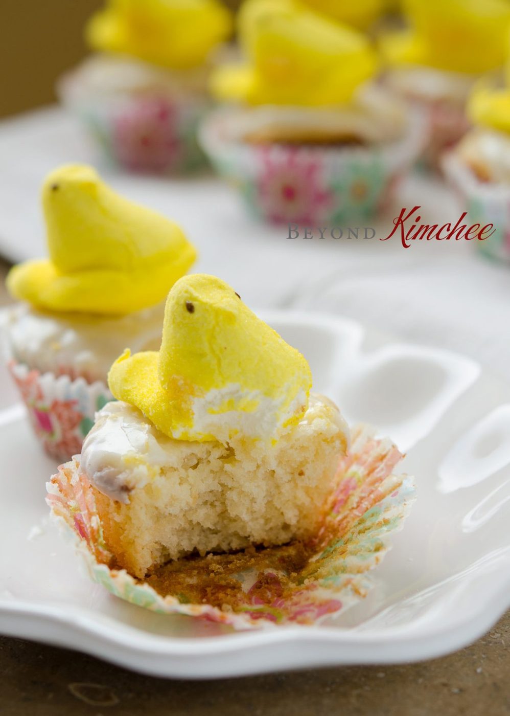 Cupcake showing its tender crumb inside.