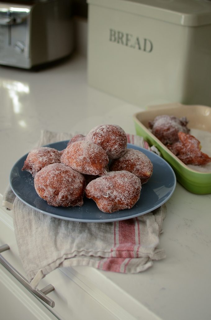 Malasadas is famous Portuguese donuts. Unfussy yeast dough is deep fried, then coated with sugar.