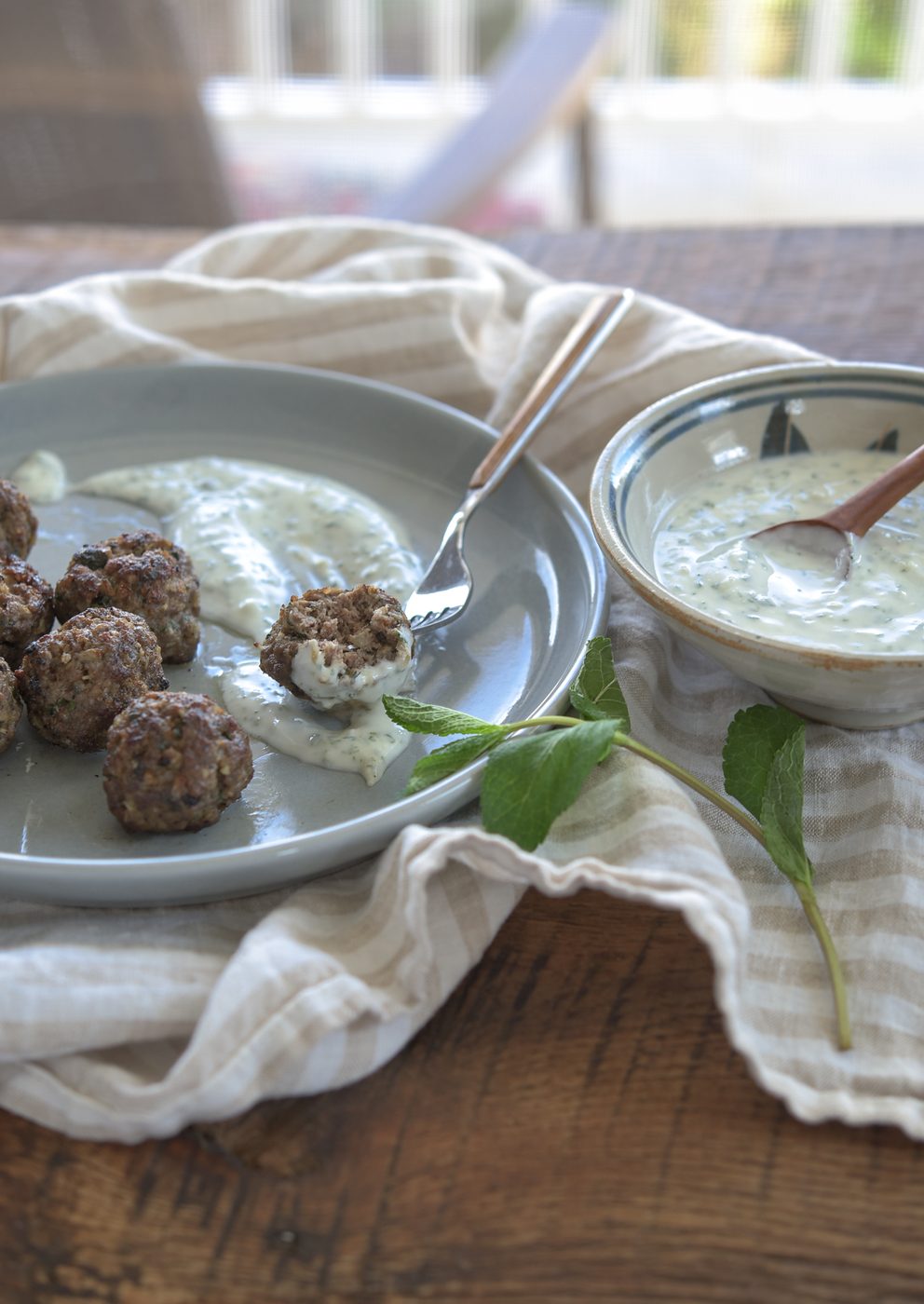 Middle eastern meatballs with yogurt dip.