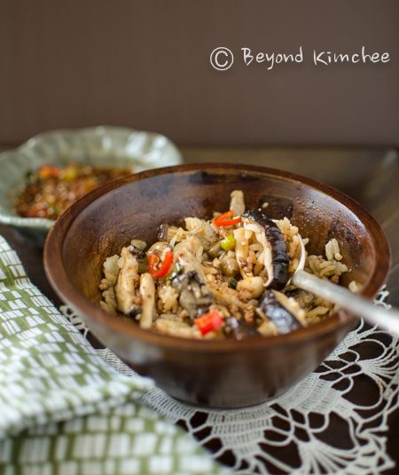 Mushroom rice bowl mixed with sauce.