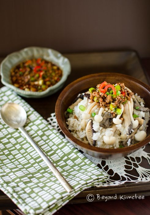 Mushroom rice bowl with topping sauce.