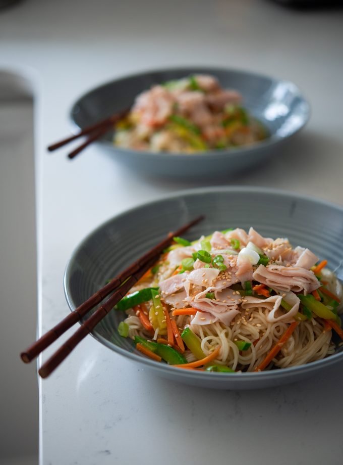 One Pot Korean Noodles and Vegetables are topped with lunch ham slices