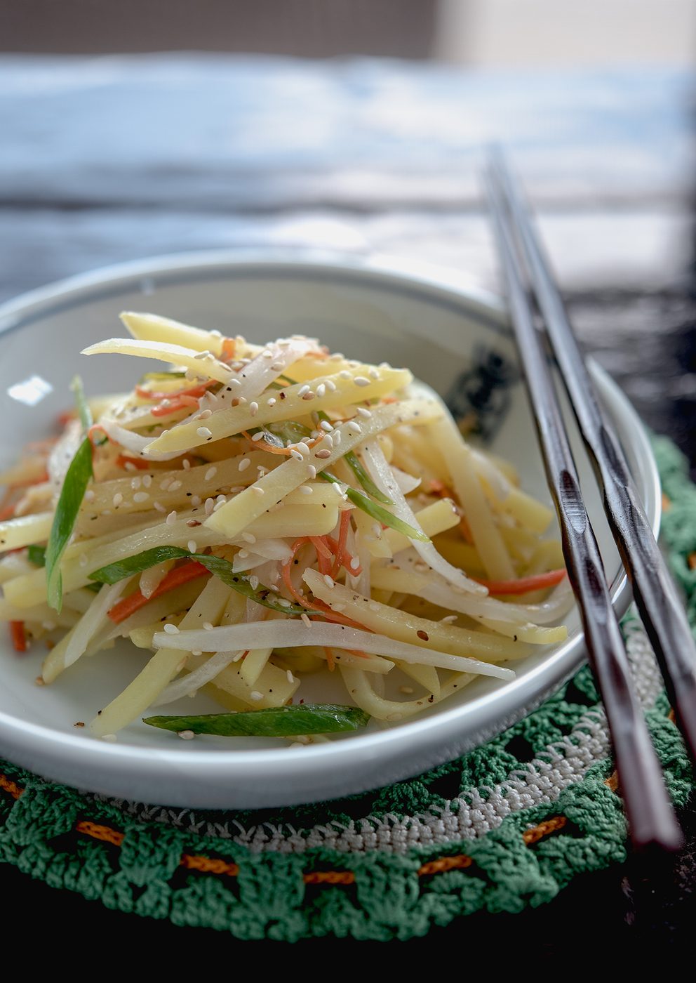 Korean potato banchan made with vegetables in a serving dish