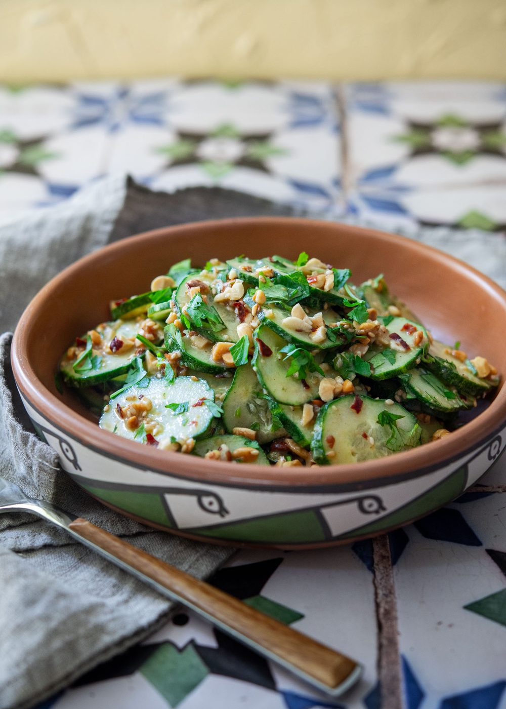 Peanut cucumber salad in a serving bowl
