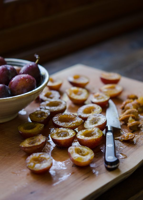 Italian prune plums cut and seeded for plum torte