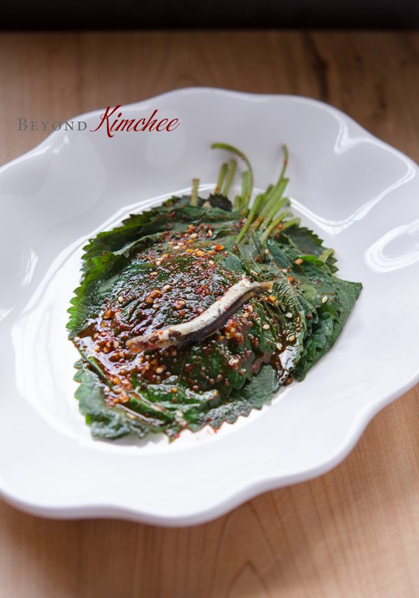 Short Steamed Perilla Leaves are cooked in a microwave and placed in a dish