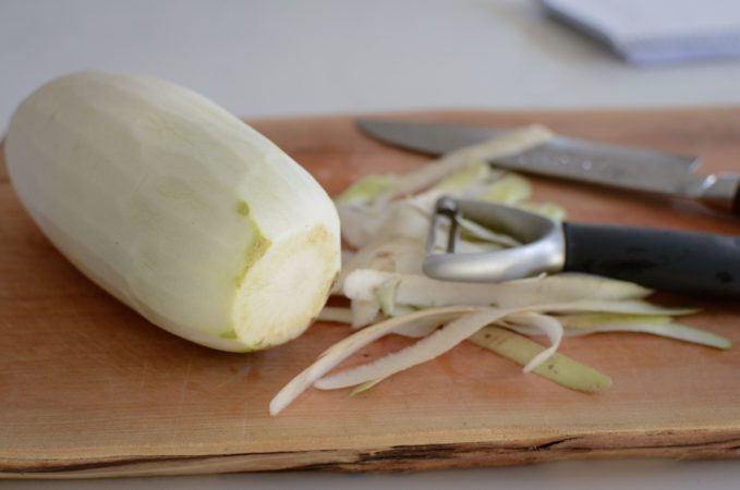 Korean radish peeled with a vegetable peeler.
