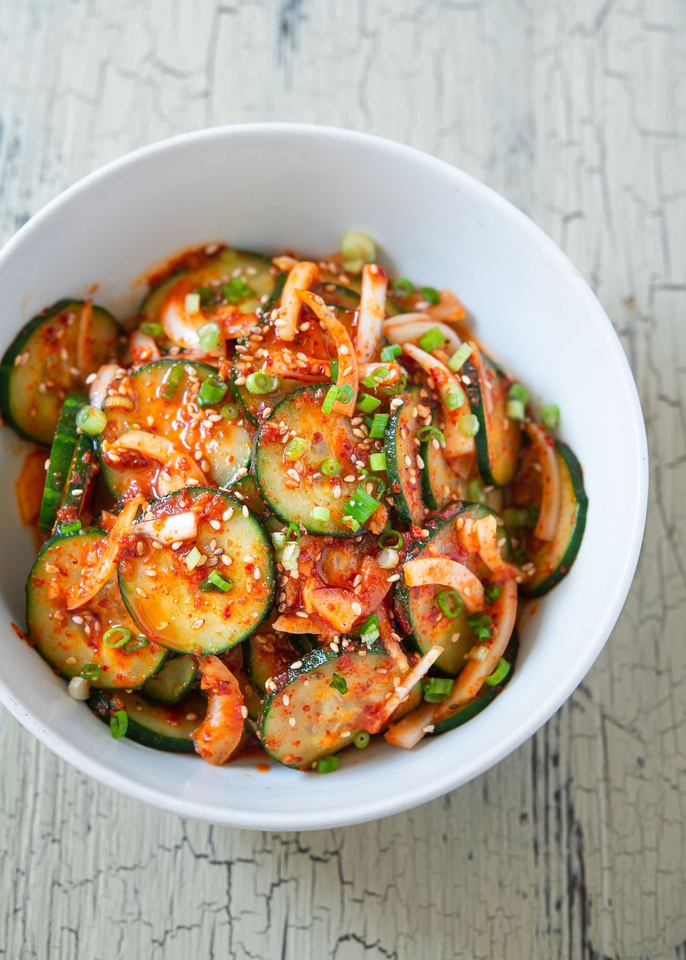 A top view of Korean cucumber salad in a bowl.