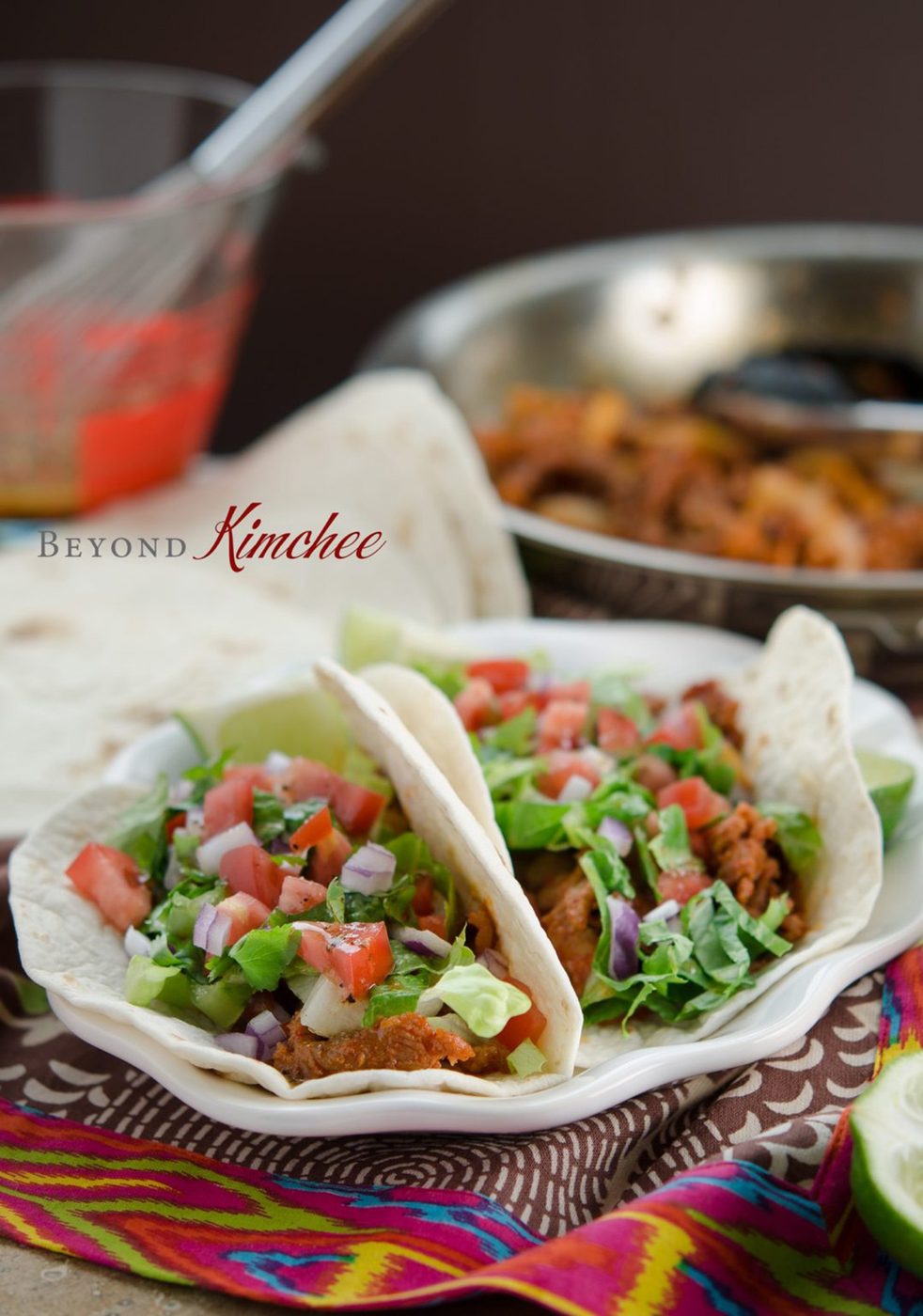 Spicy Korean pork bulgogi taco with all the fixings.