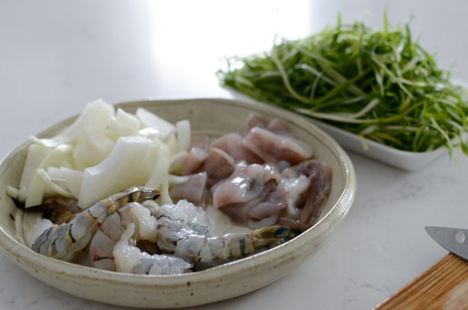 Shrimp and squid in a plate.