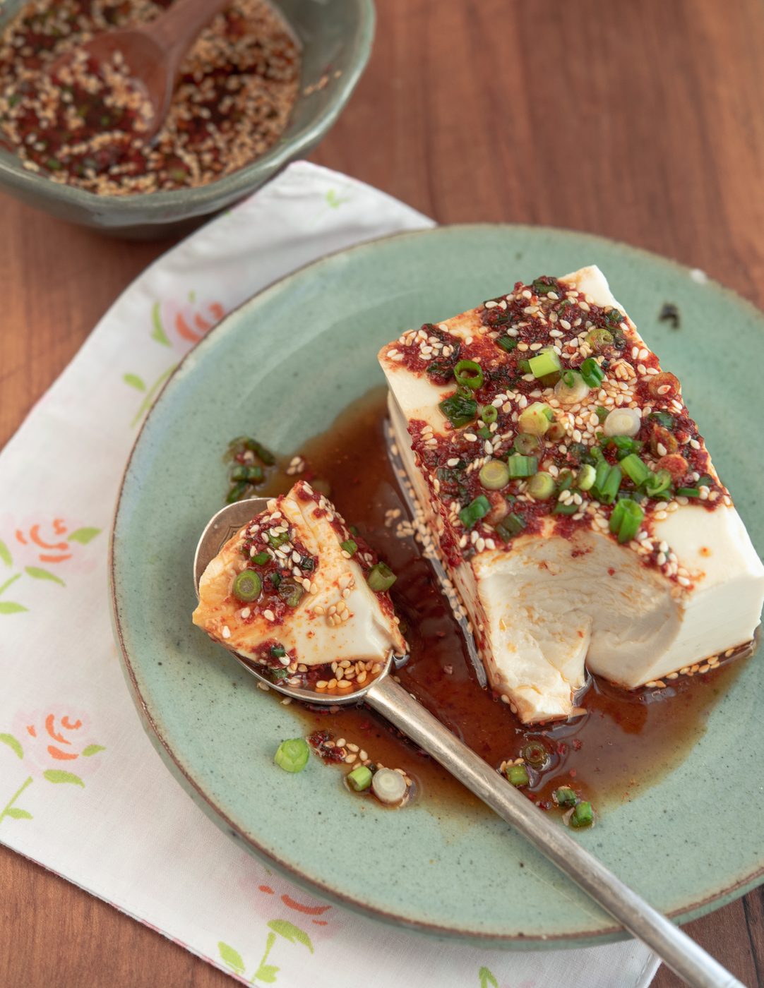 Silken tofu with soy chili sauce served warm and ready to eat