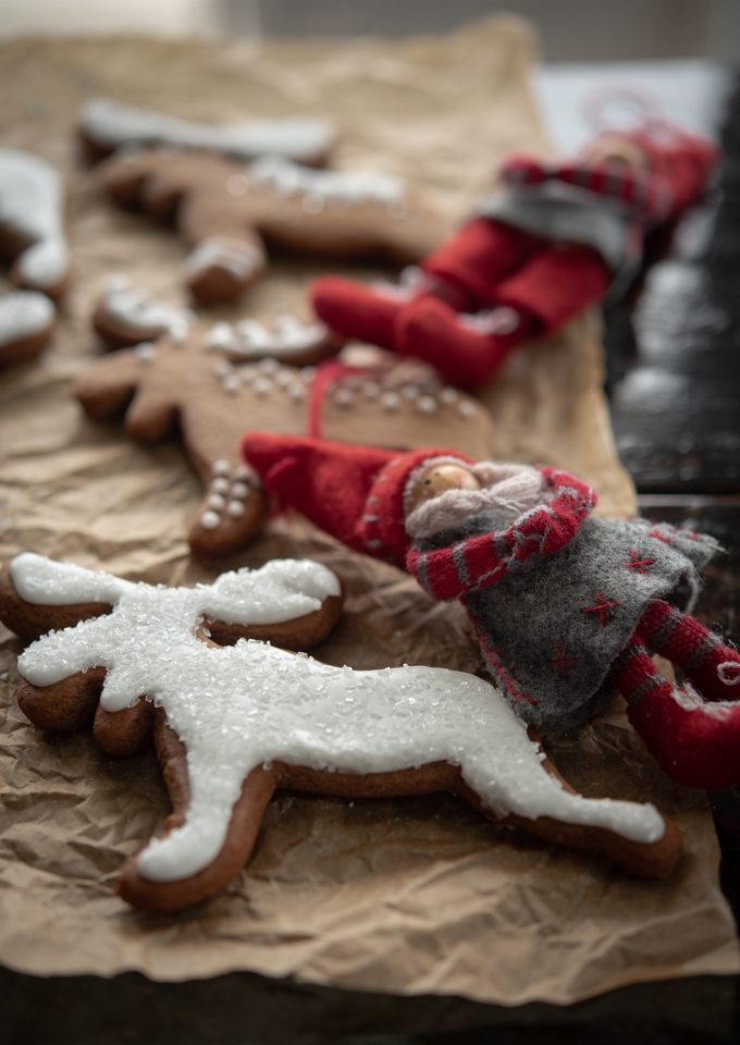 Scandinavian ginger cookies are decorated with unfussy white icing and sparkling sugar