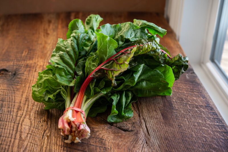 A bundle of Swiss chard with red stem