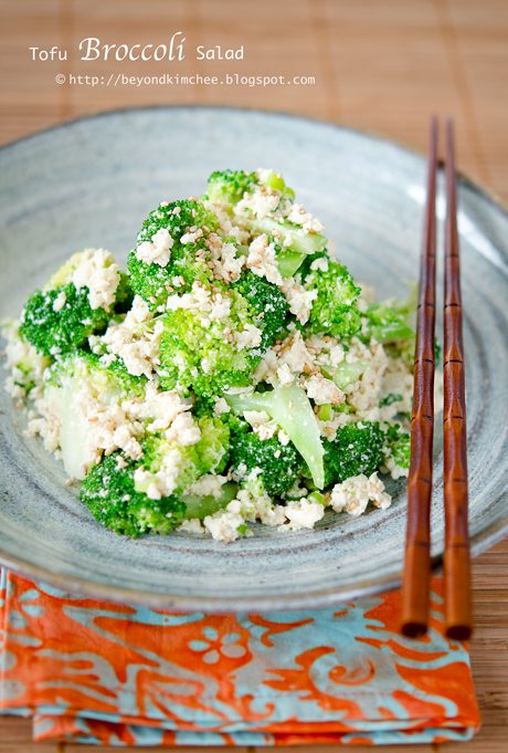 Tofu Broccoli salad on a serving dish with chopsticks.