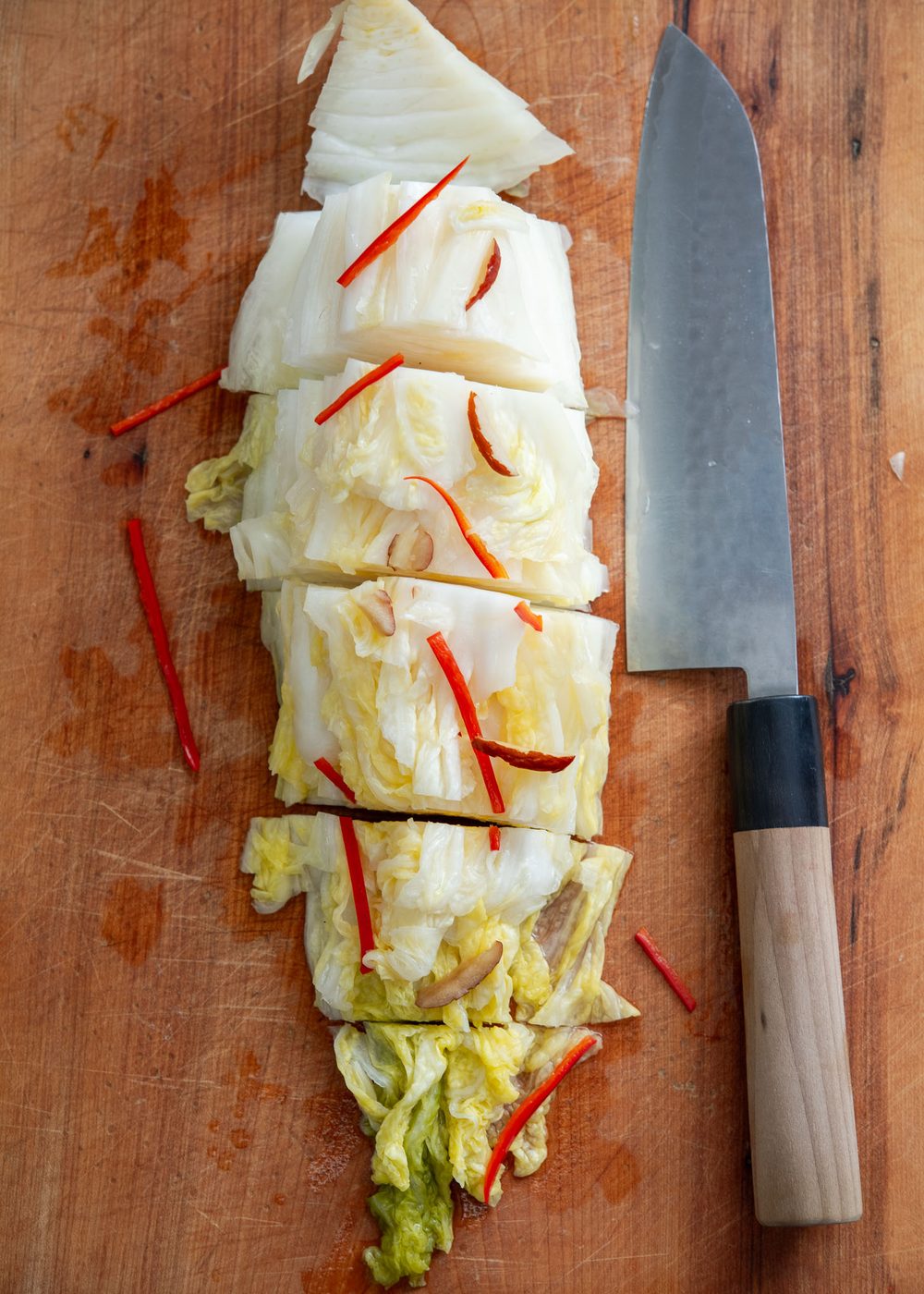 White kimchi (baek kimchi) sliced into neat pieces for serving