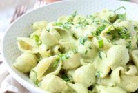Vibrant Basil Pesto Pasta with Gooey Cheese