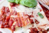 Hearty Three-Cheese Manicotti with Robust Italian Sausage Marinara