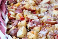 Golden Cheesy Grilled Potatoes