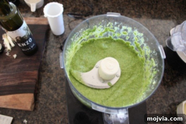 Robust Arugula Walnut Blue Cheese Pesto 6 Smooth and creamy Arugula Walnut Blue Cheese Pesto after blending in a food processor.