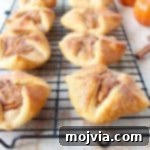A square image showcasing the finished, delicious pumpkin filled pastries.