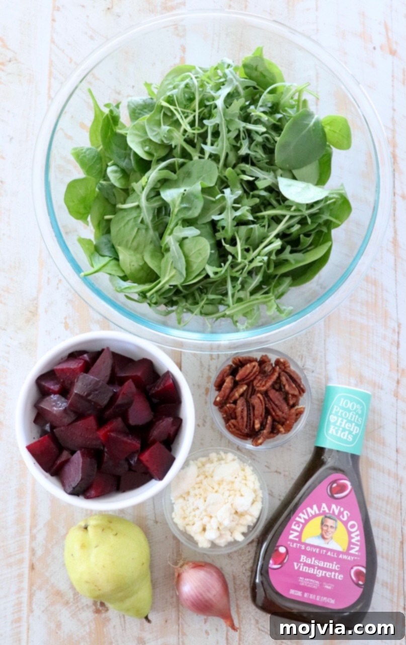 Ruby Beet Feta Salad 3 Close-up of a refreshing beet salad with vibrant greens, roasted beets, and crumbled cheese