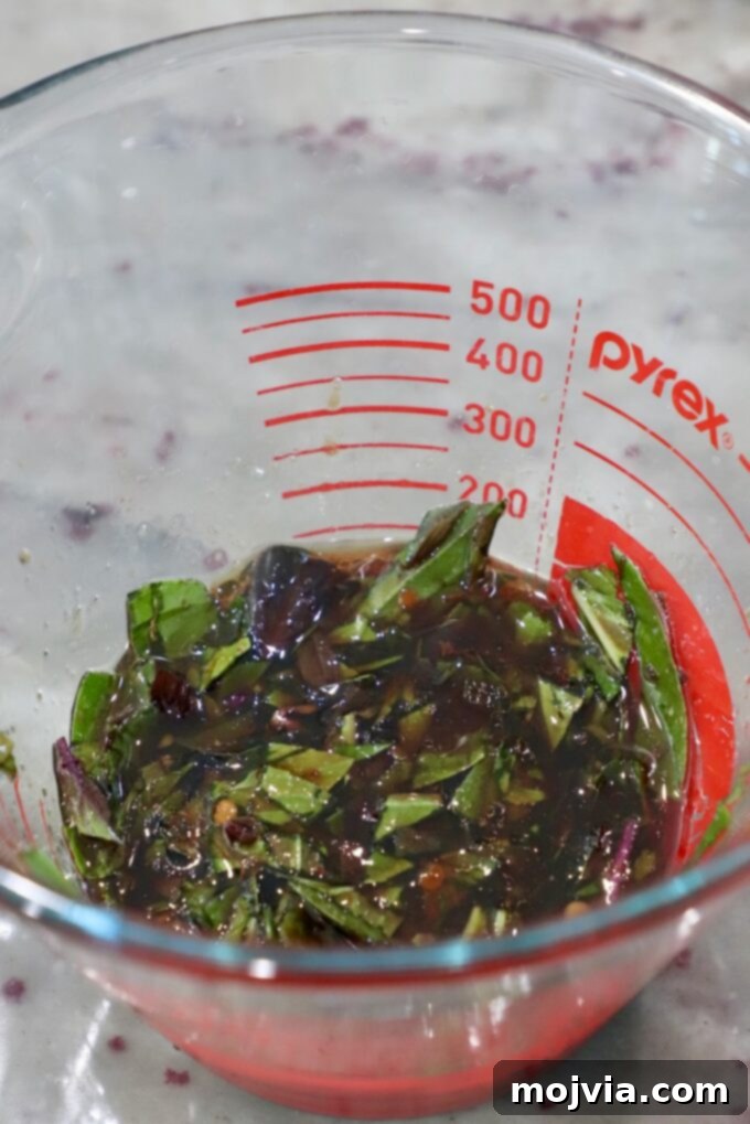 sauce for drunken noodles in glass measuring bowl